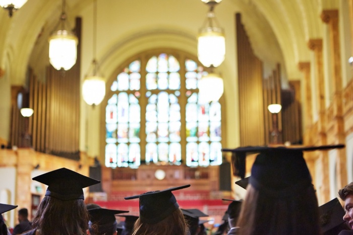Students at a graduation ceremony in the Great Hall