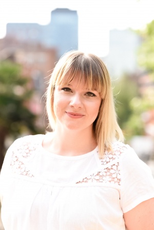 Amelia Ladbrook looking straight ahead wearing a white t-shirt