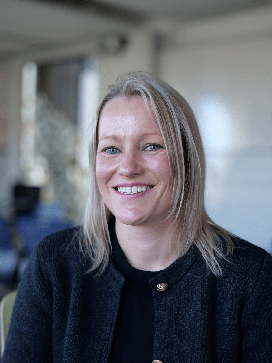 Dr Vicky Goodyear smiles for a portrait picture.