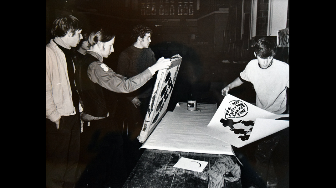 Student protesters print off posters